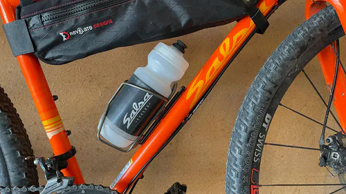 After adaptor installation, bottle cage repositioned 52mm down making room for both the bottle and half frame bag.